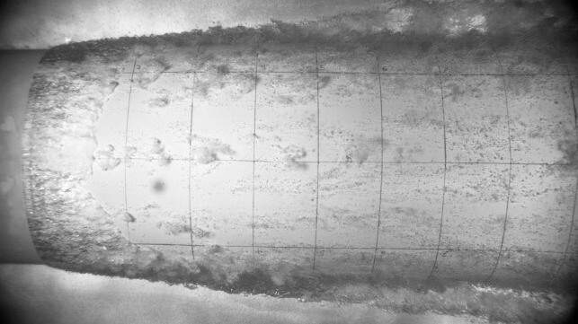 Air passing over the flat bottom of the hull. The photo was taken in the Cavitation Tunnel at SINTEF. Photo: SINTEF.